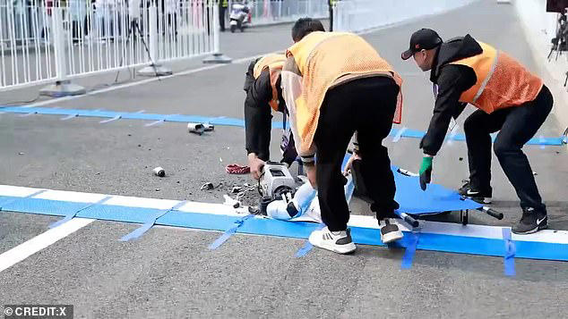 Hilarious moment robot smashes into pieces after tripping during ...