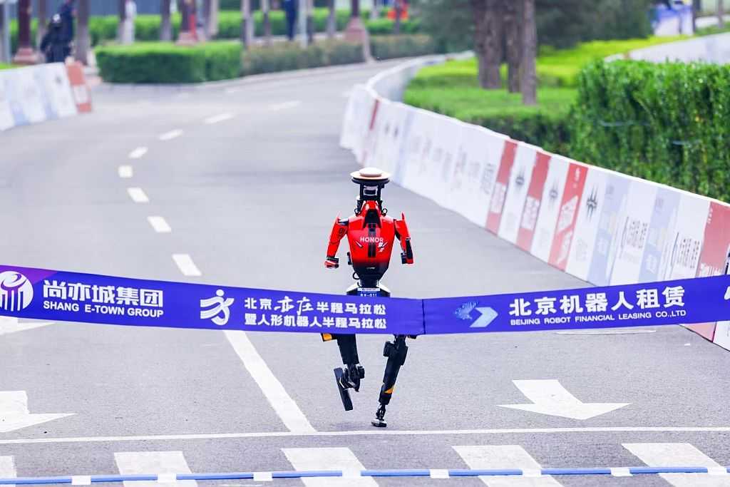 Watch: Humanoid robot sprints to victory in China, beating the human ...