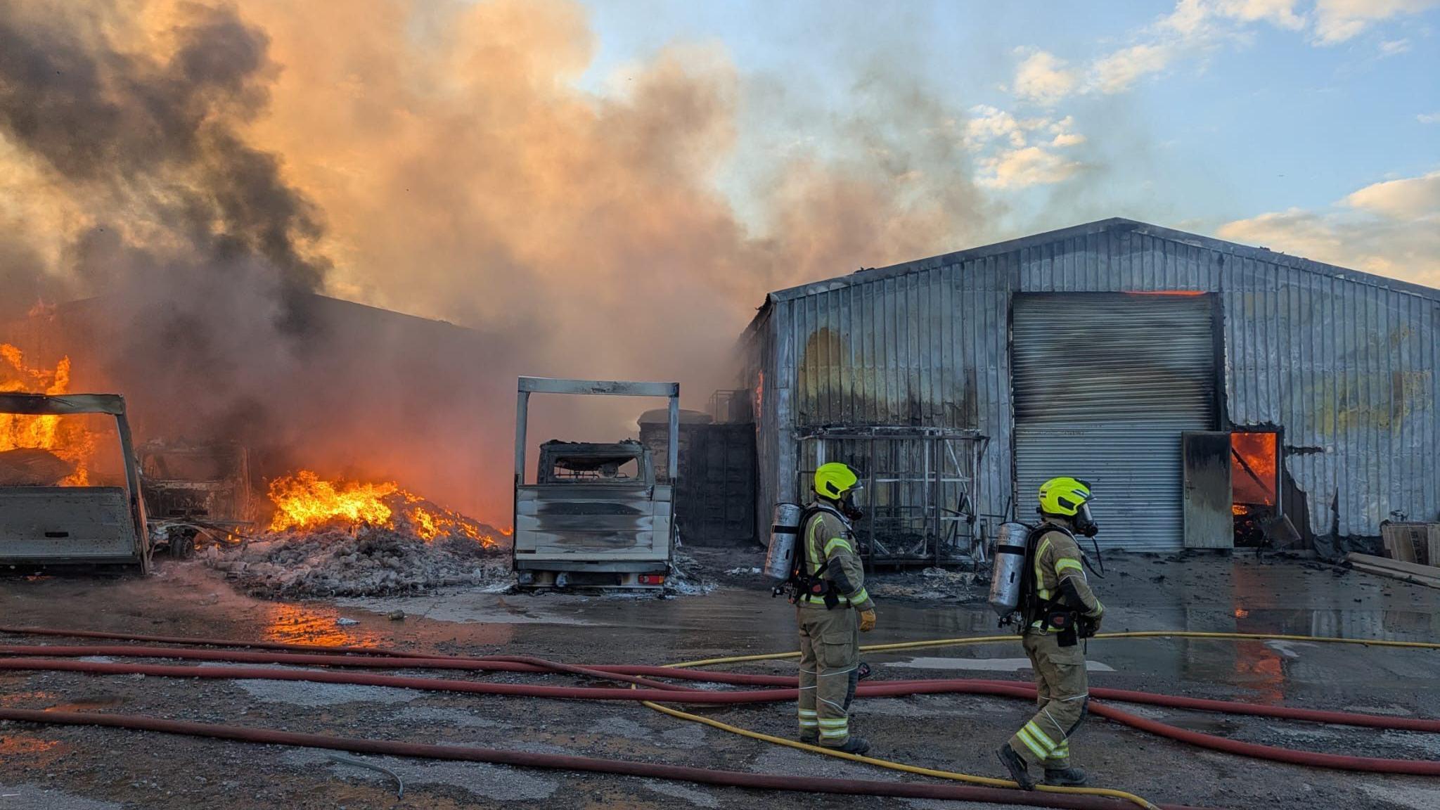 Vehicles and units on fire at industrial estate