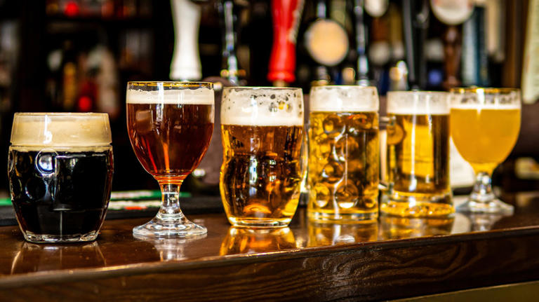 Yes, there's a right way to hold your beer (and you're probably not ...