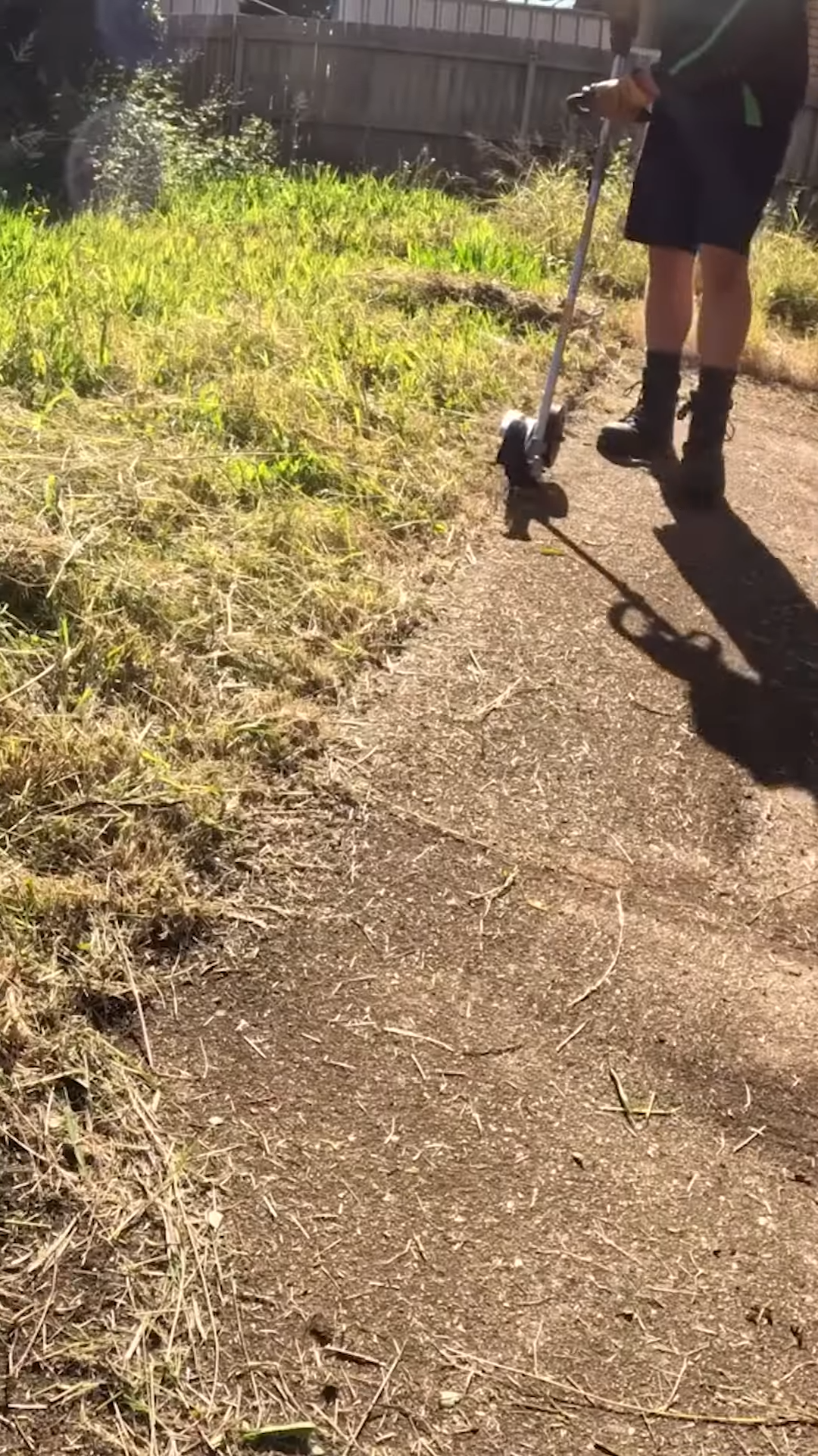 Voluntary yard cleanup restores footpath buried under heavy overgrowth