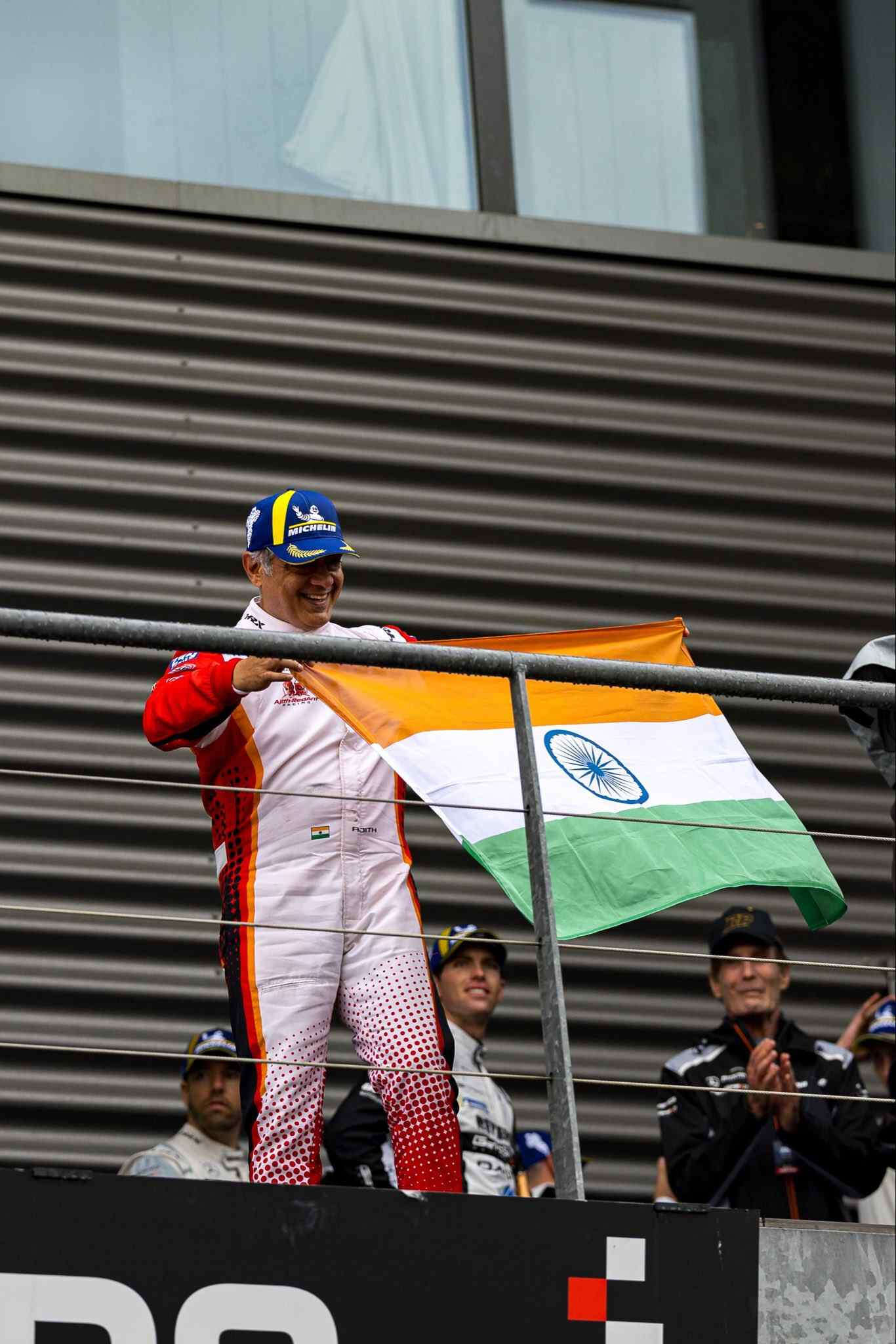 Pics: Superstar Ajith Kumar waves Indian flag after podium finish at ...