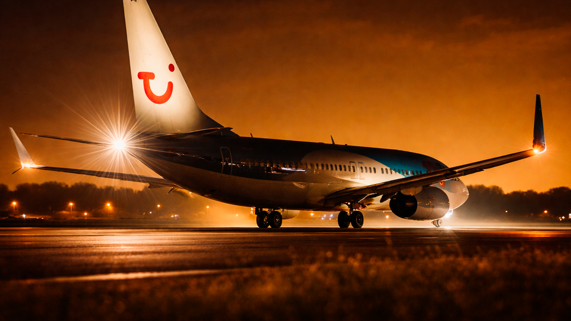 Aircraft lands in darkness with blinding runway lights