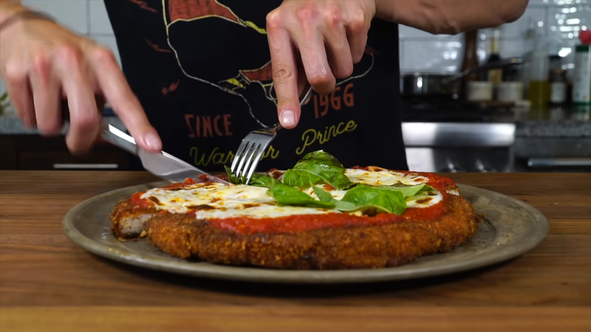 Chicken parm pizza with a giant chicken cutlet