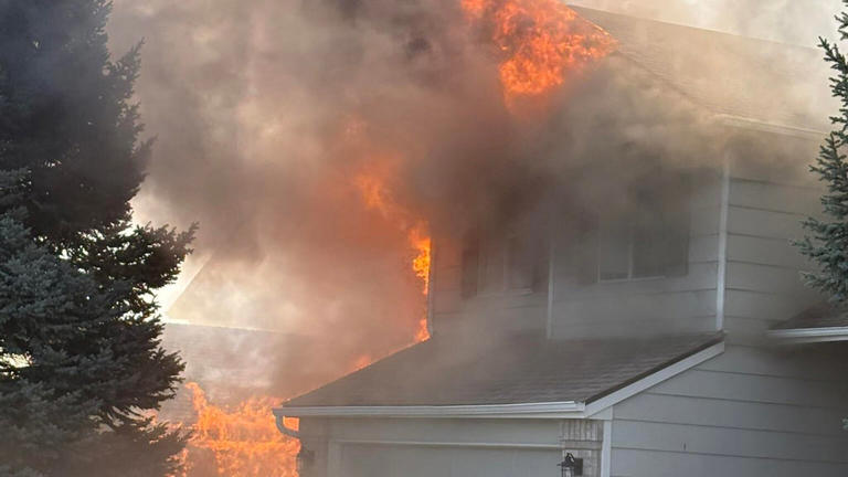 Colorado firefighter rushed to hospital as flames engulf home
