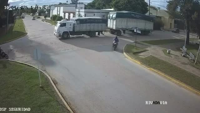 Truck snags overhead cables and sweeps motorcyclists off their bikes