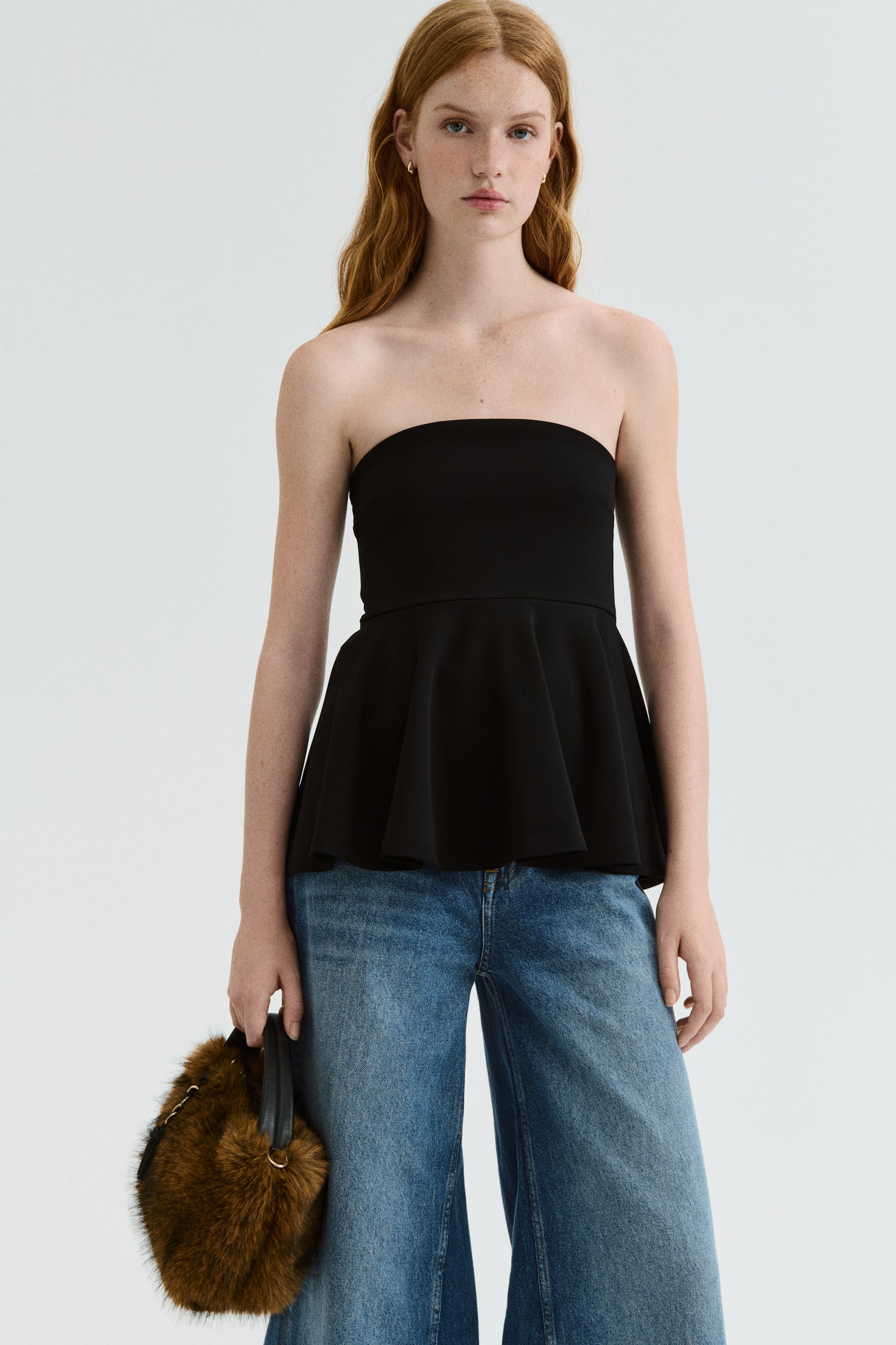 Peplums are back on top this year—here's the updated way to wear them ...