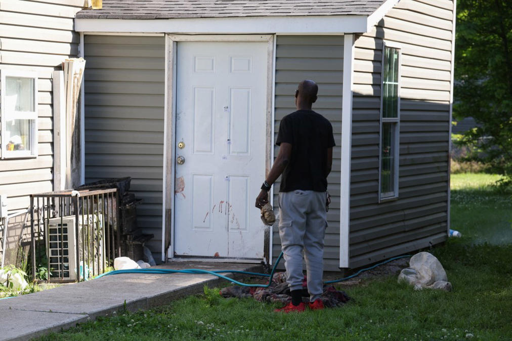 A door splattered with blood at a home in Shreveport, Louisiana, where a mass shooting left eight children dead. REUTERS