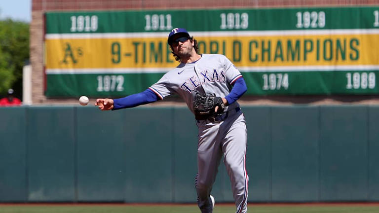 Skip Schumaker facing tough call at second base for Rangers