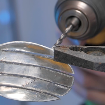 Crafting a unique pendant from everyday objects!