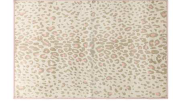 Five Below's $7 washable cheetah rug brightens any space