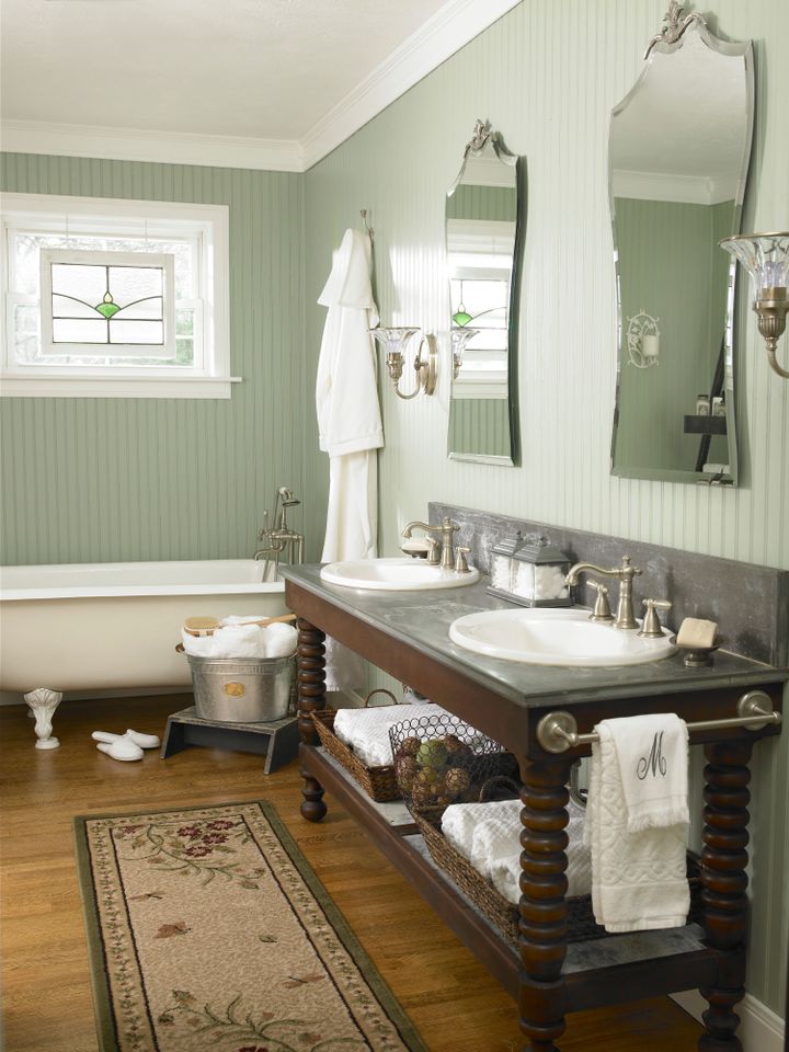 Green bathroom with wall paneling