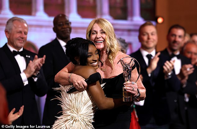 Simone Biles steps out in $11K gown at sports awards after admitting her  own fans make her anxious