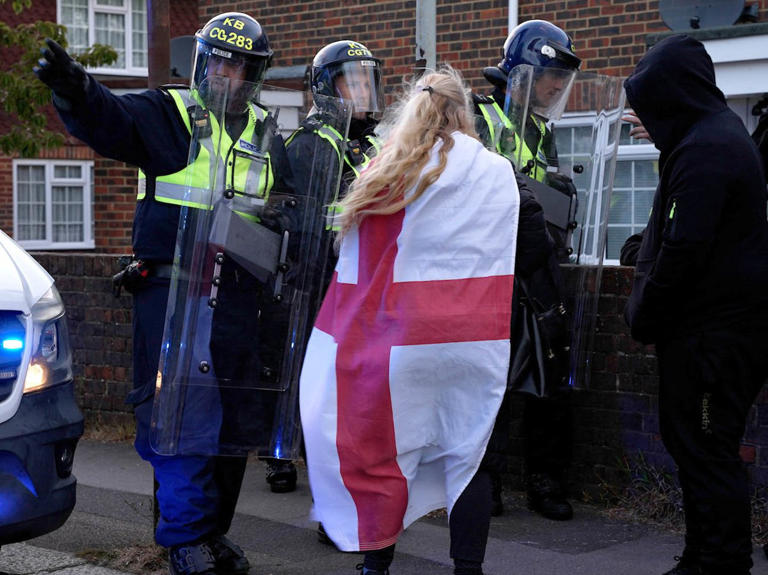 Chaos in Epsom as protesters hurl eggs and beer cans at police