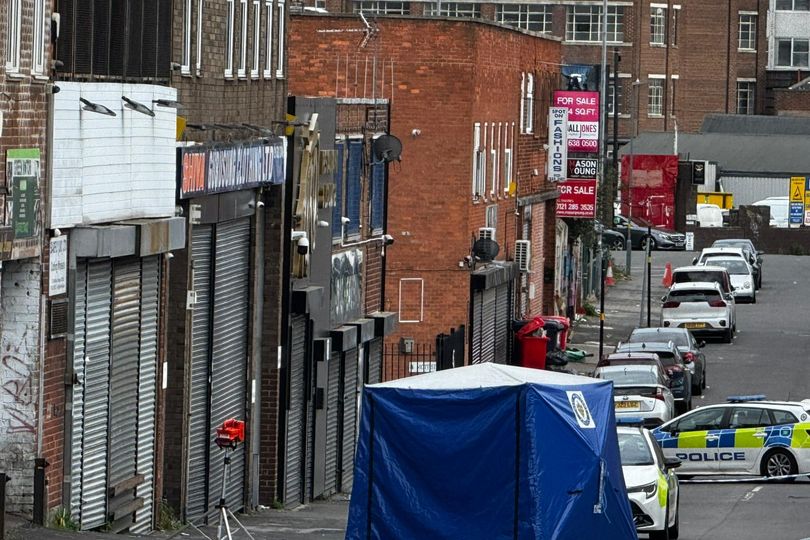 Police scene 24 hours after man found dead in Birmingham street as road ...