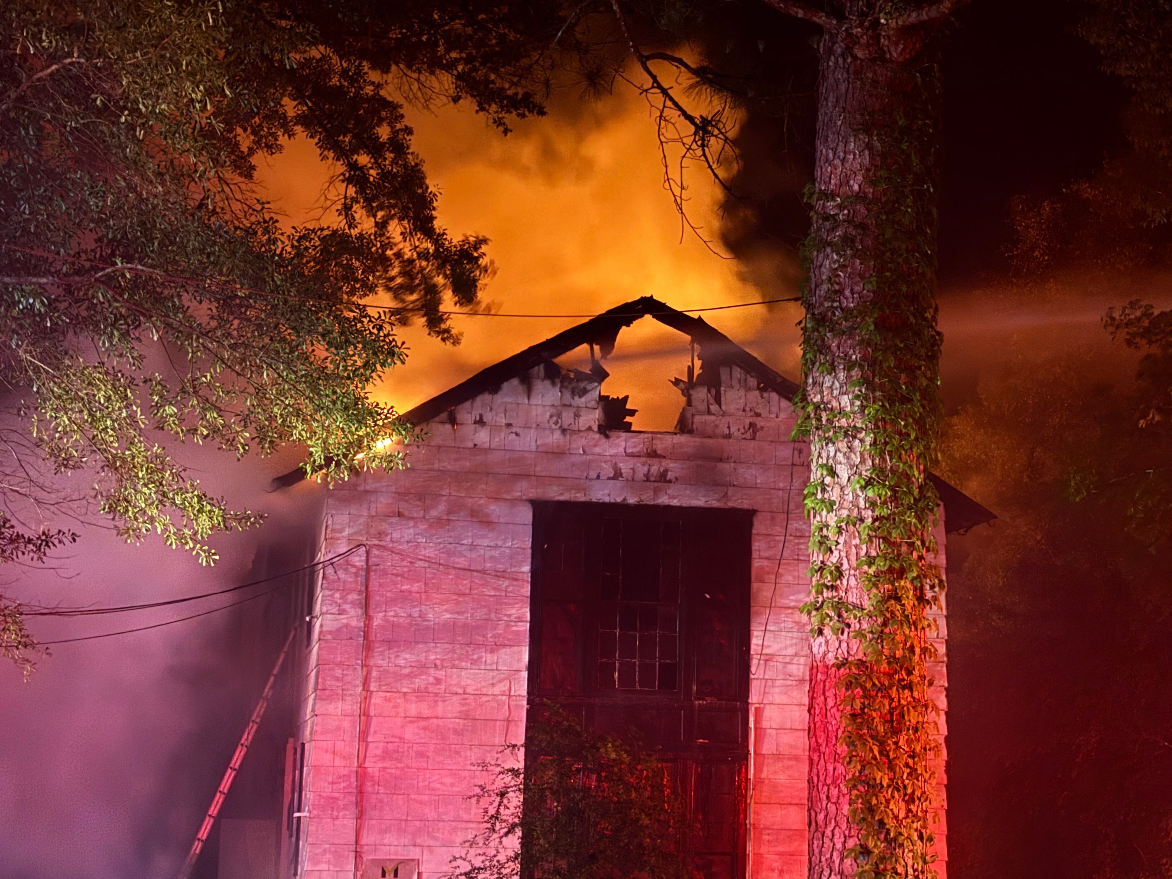 Firefighter injured while battling vacant apartment fire in Jackson