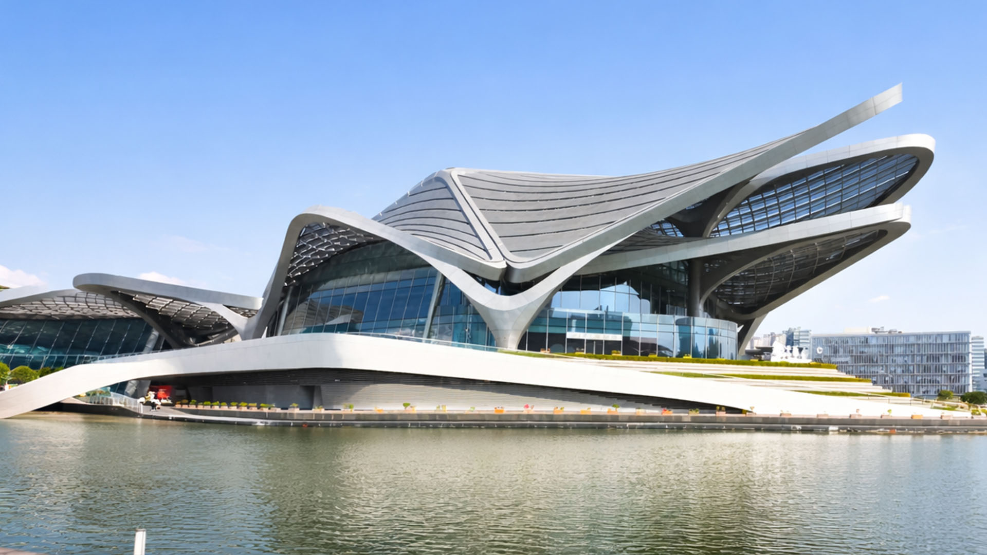 A massive butterfly landmark transforming this entire urban waterfront area