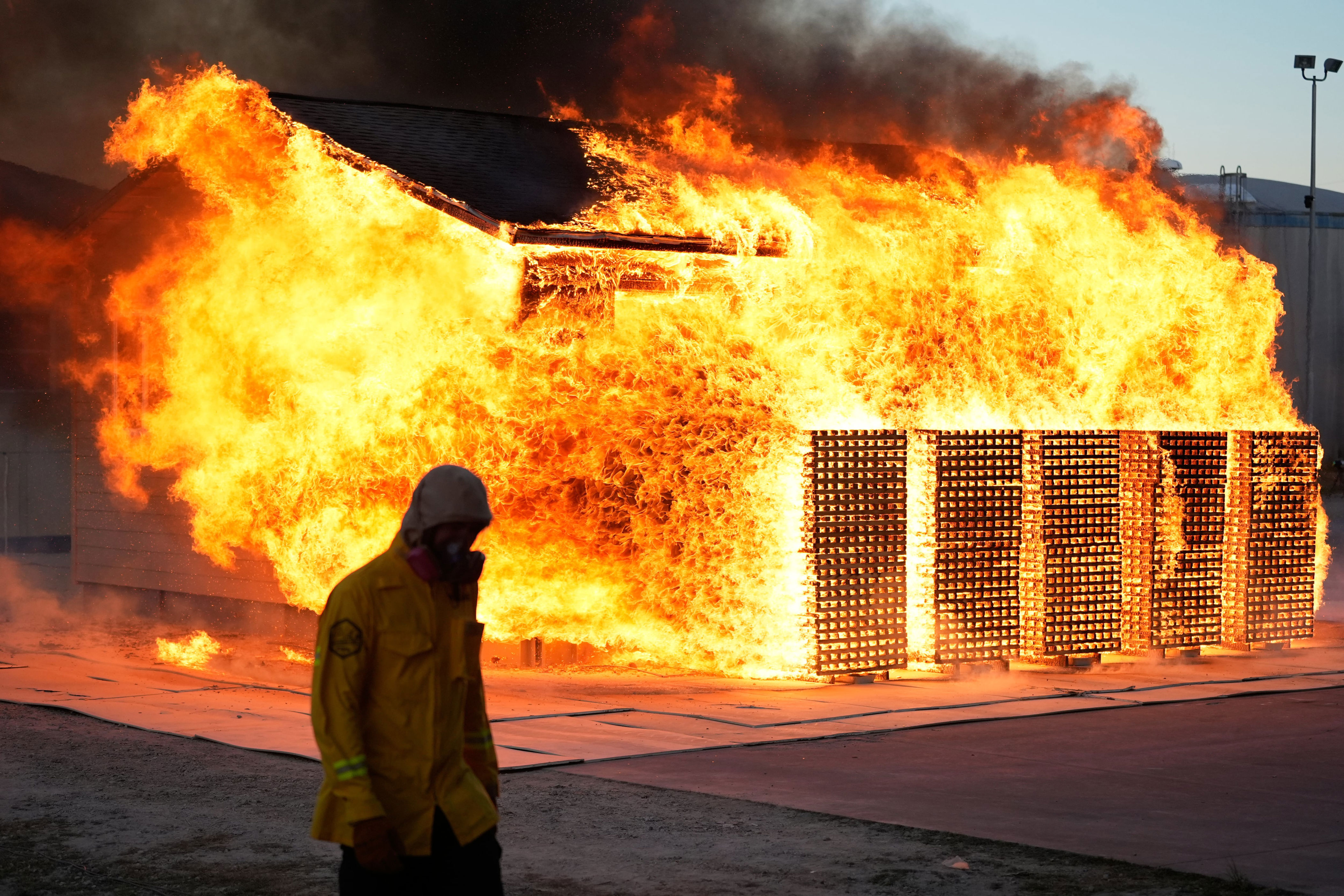 As the planet warms, scientists burn homes to figure out how to best ...