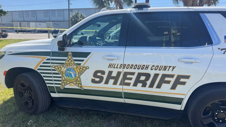 Tampa shooting under investigation after man found dead in business ...