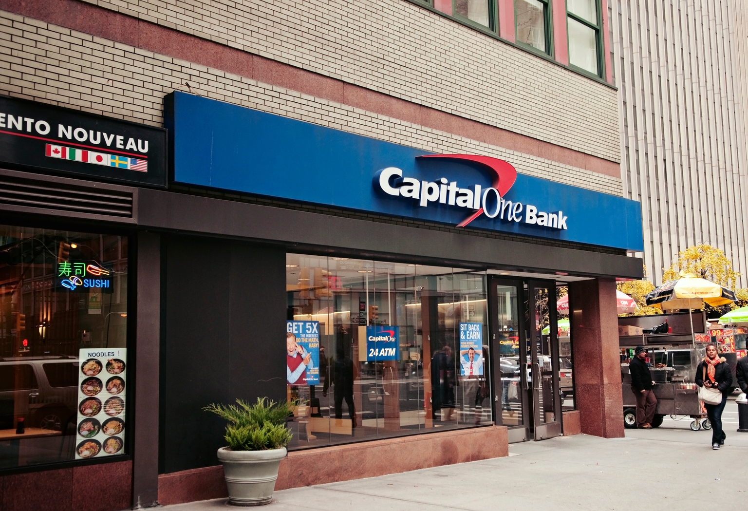 Capital One stock climbs as lower credit loss provision, expenses drive ...