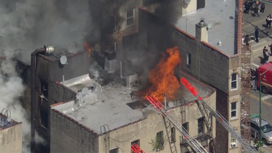 Fire consumes upper floors of Bronx building