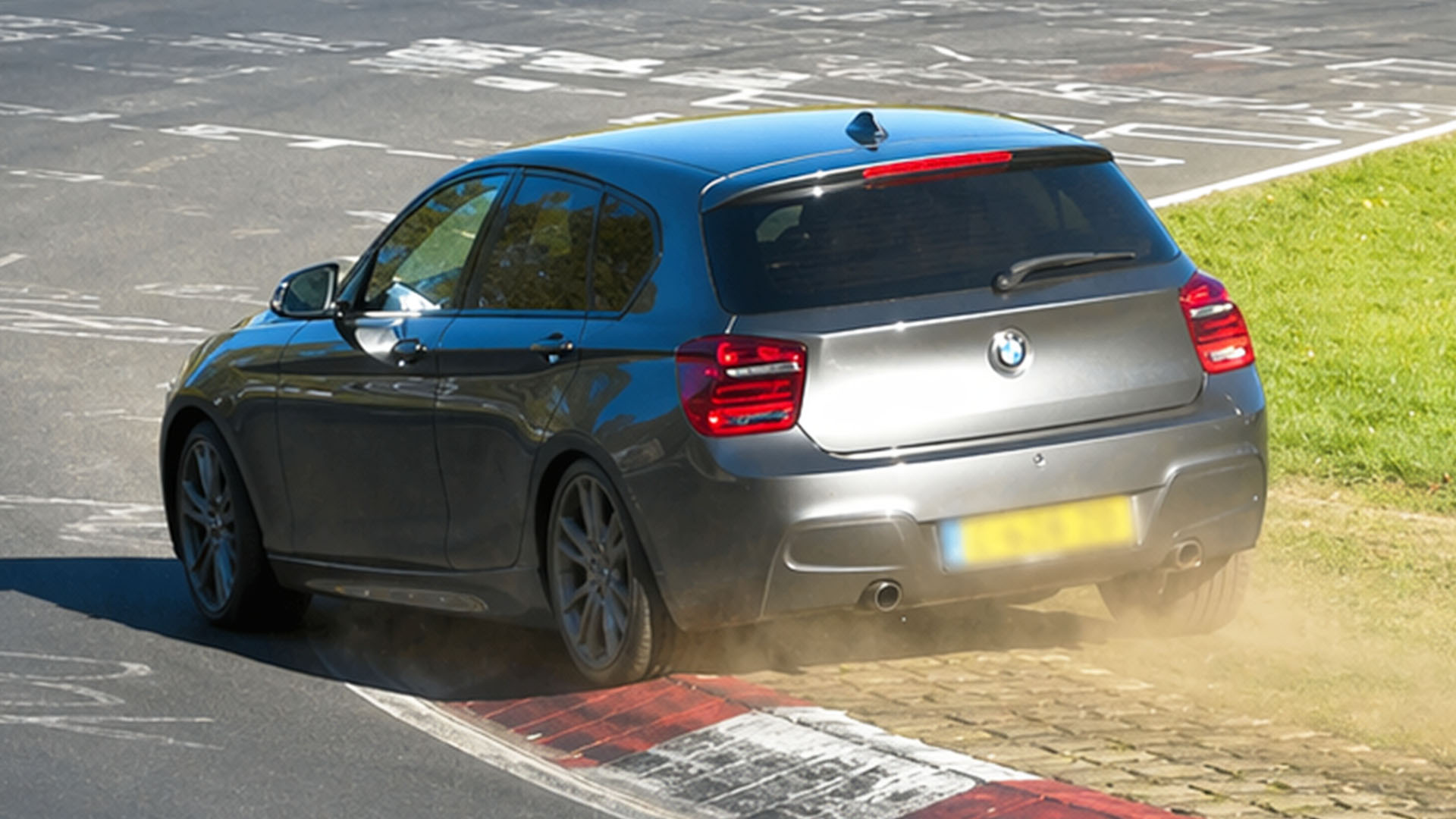 Driver misjudges corner sending BMW wide at Nürburgring exit