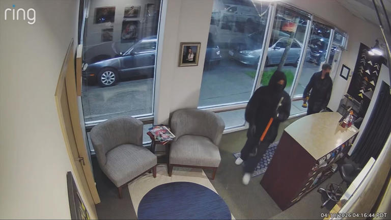 Masked men caught on video burglarizing Seattle photo studio