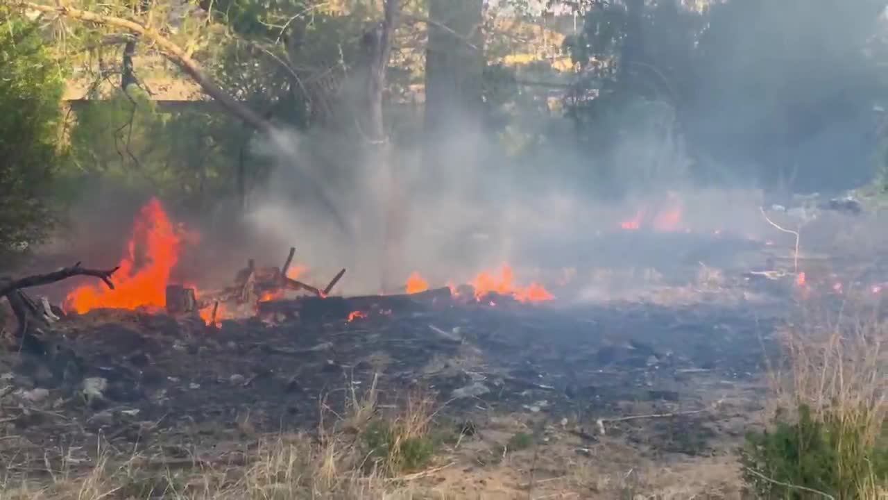 Grass fire under control near Circle and Fountain