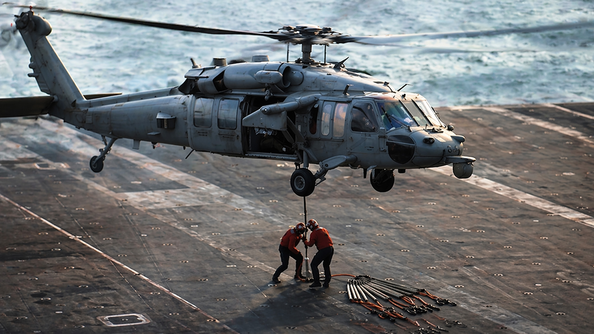 Watch warships get supplies in the ocean
