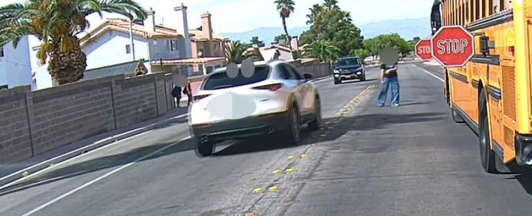 Caught on camera: Driver blows past stop arm on school bus in Las Vegas