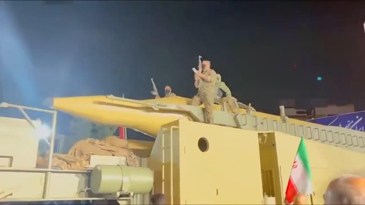 Iran displays what looks like ballistic missile launchers during pro ...