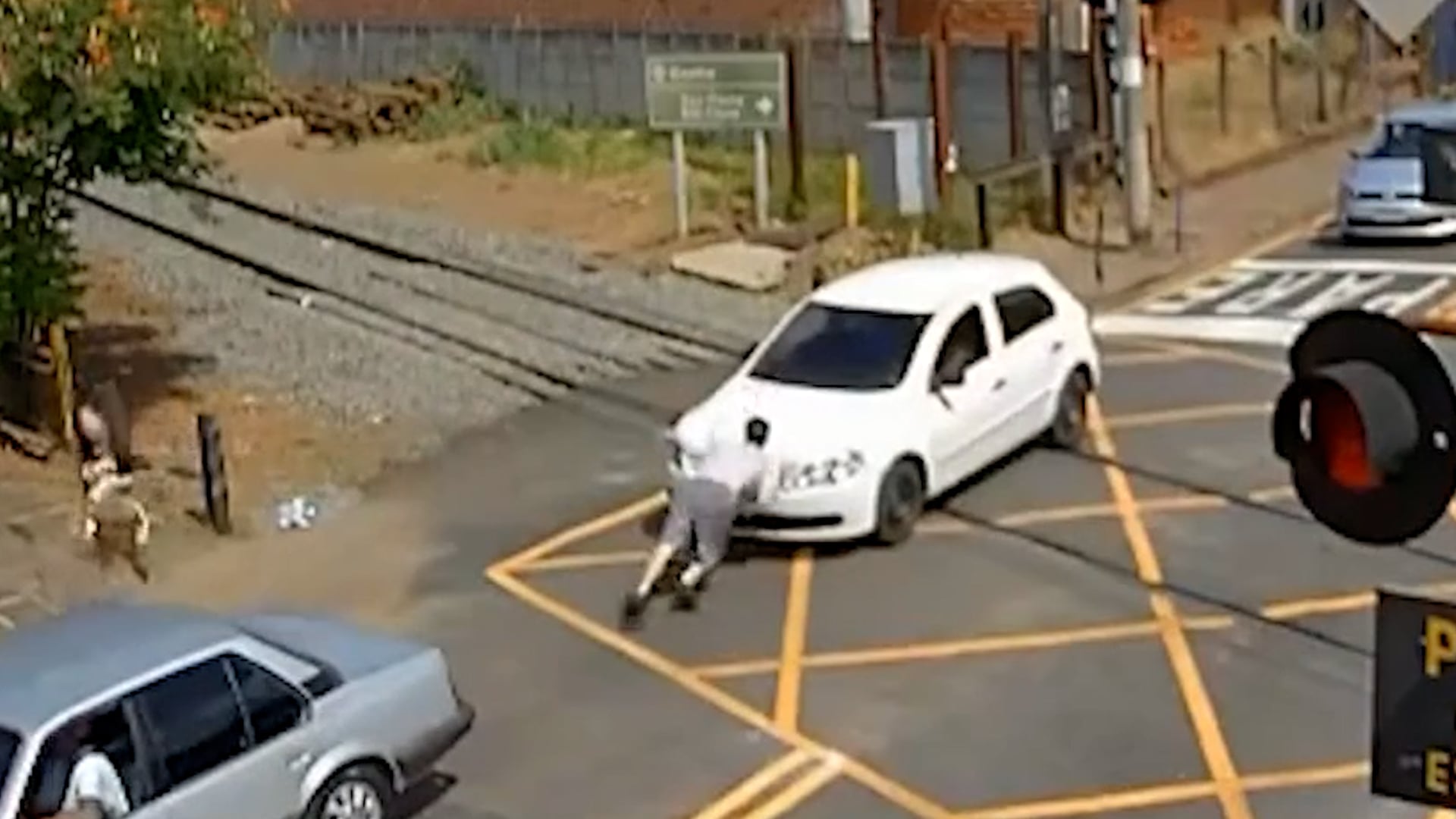 Dramatic moment train hits car stuck on railway crossing