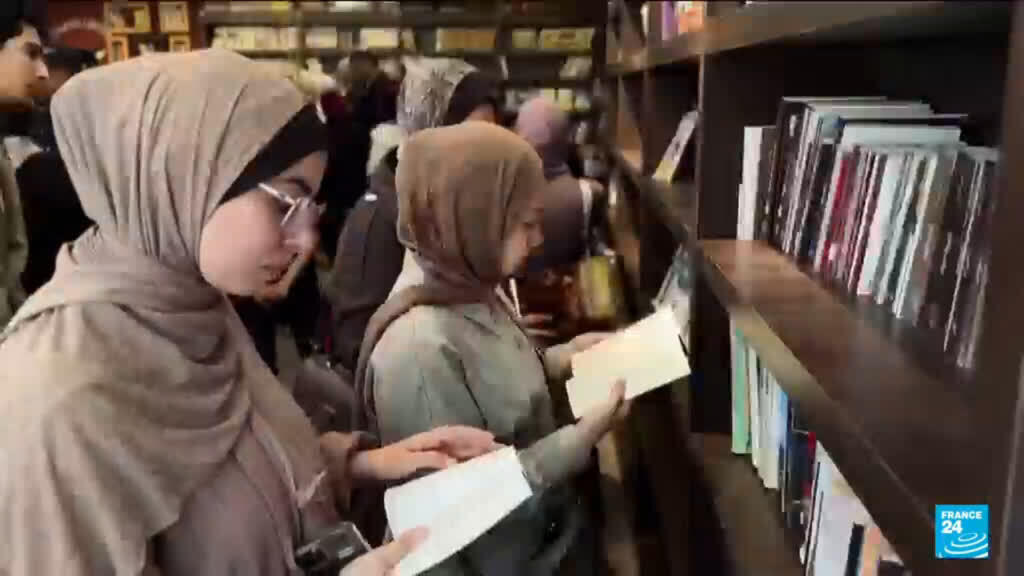 Displaced Palestinians return to books as Gaza's Phoenix library rises ...