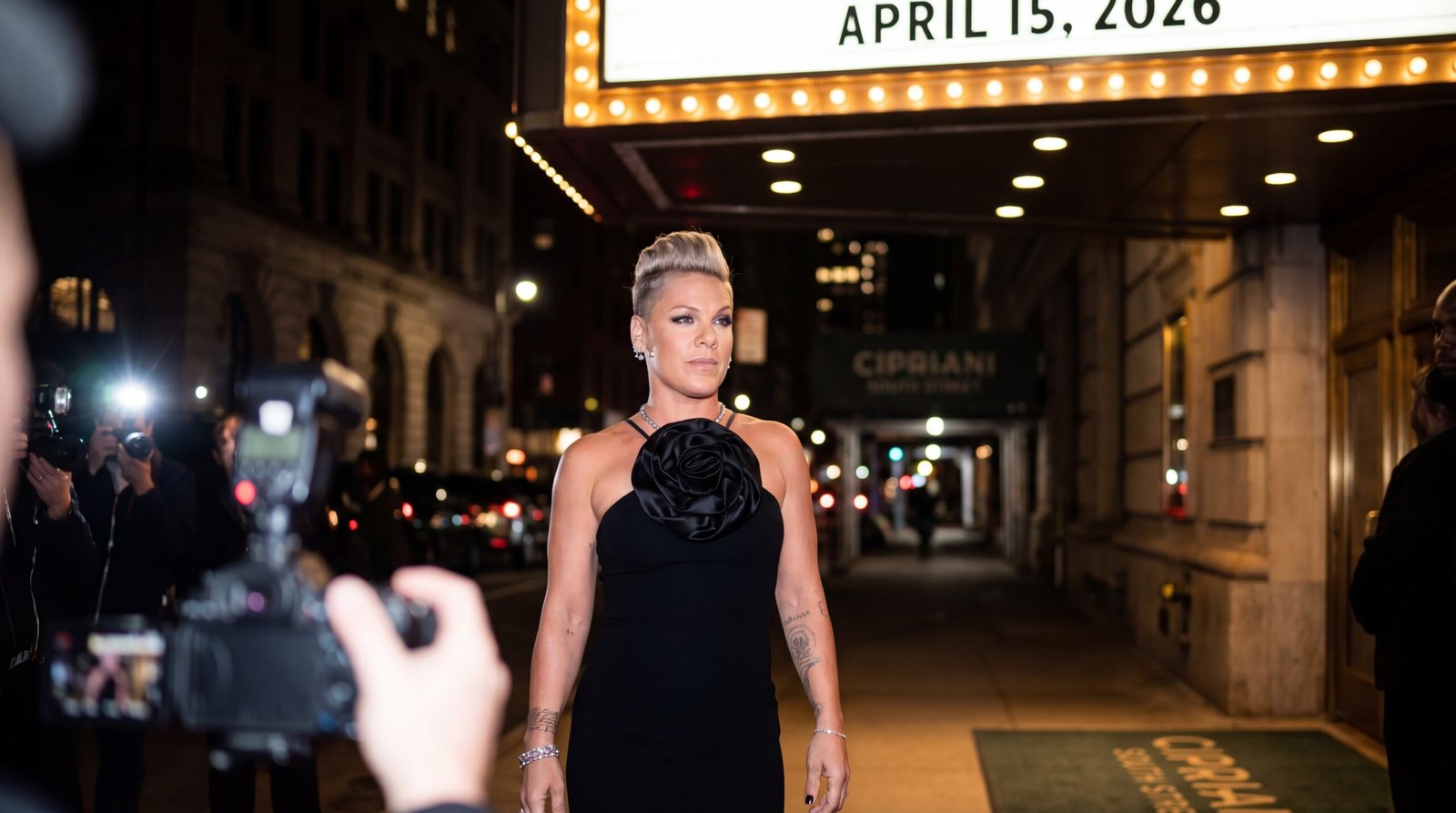 Pink flaunts her figure in body hugging strapless gown on the red carpet