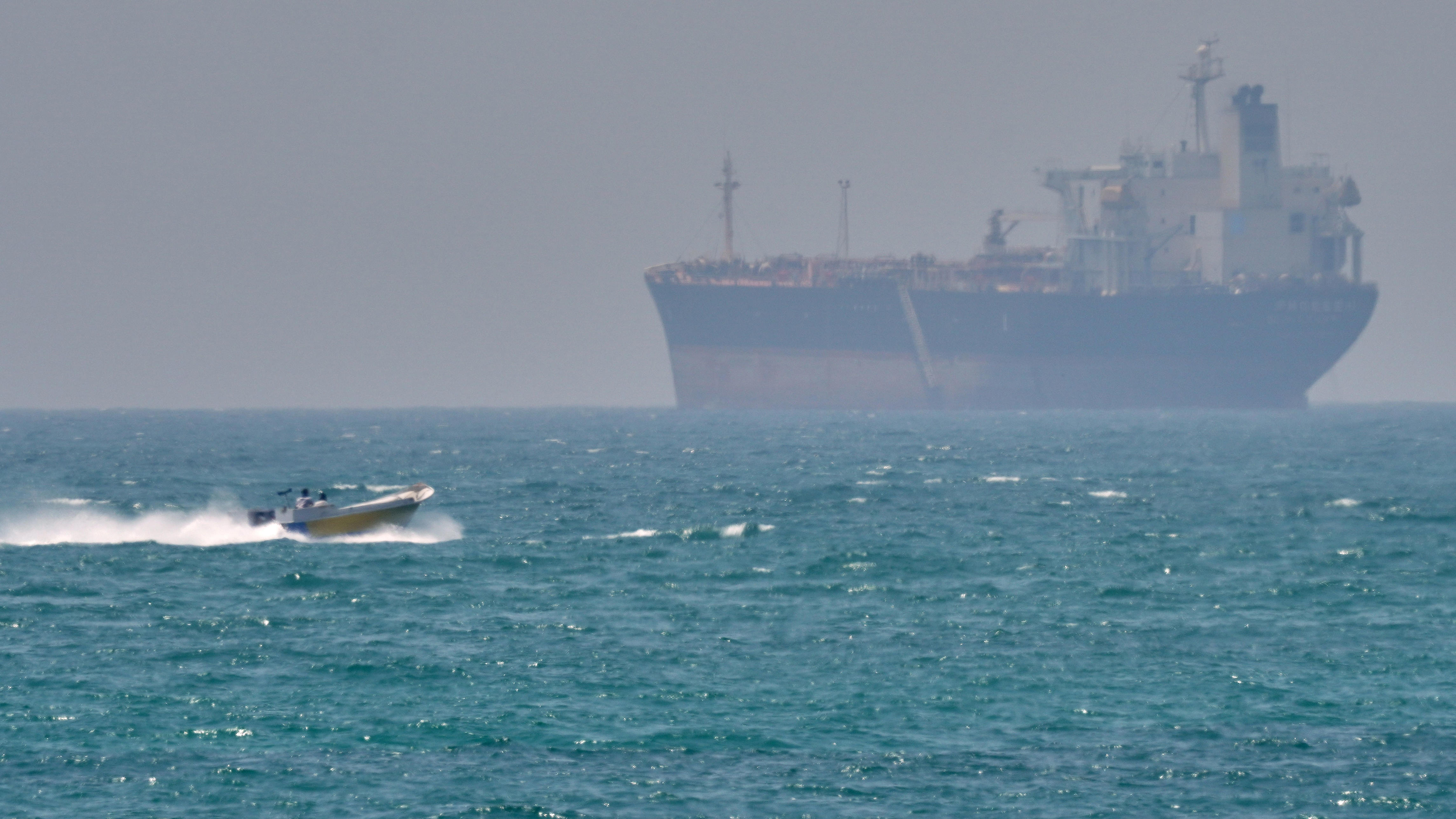 Iran fires on three ships in Strait of Hormuz derailing US-Iran talks push