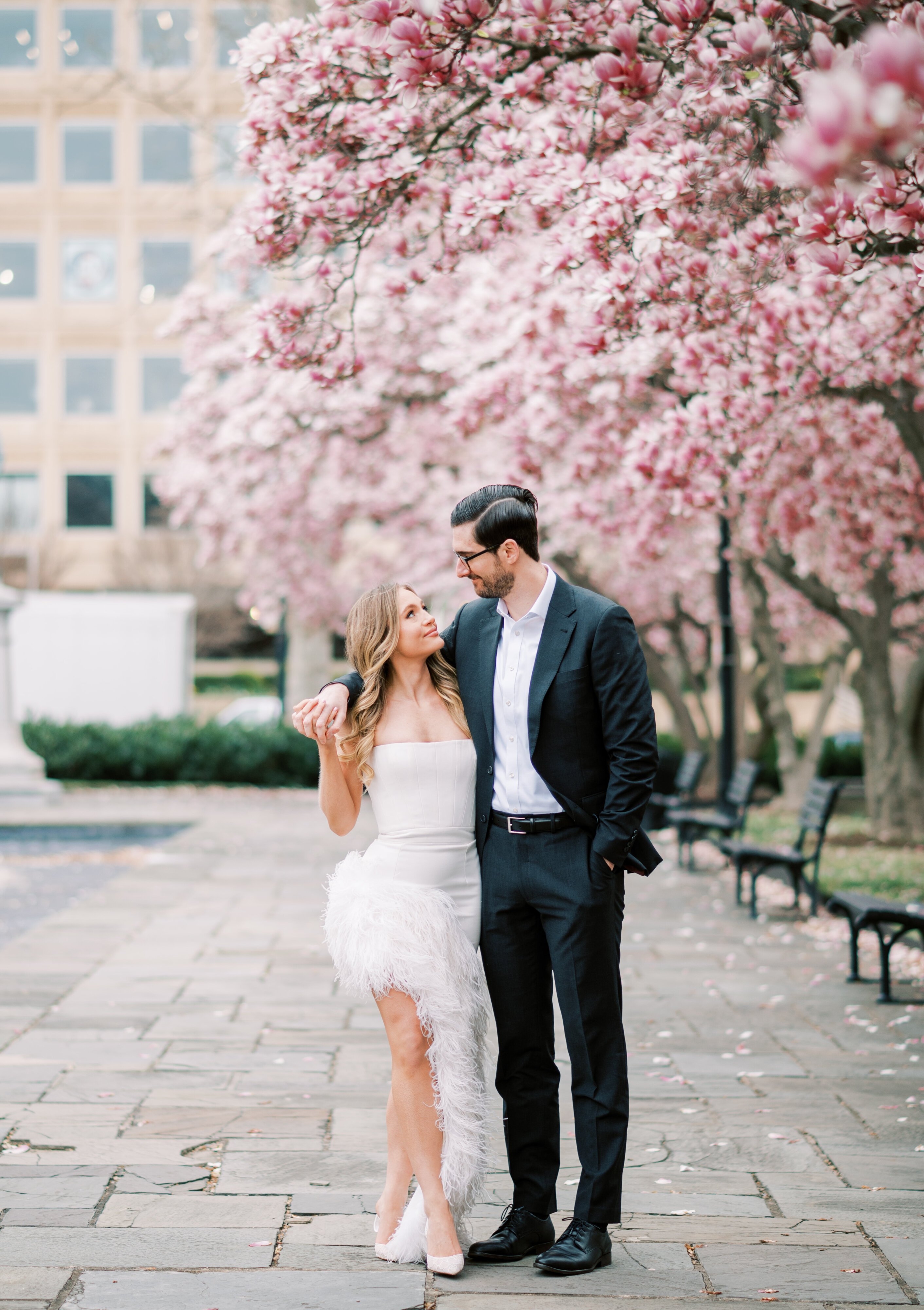 A chic pink-magnolia-infused springtime engagement session in DC