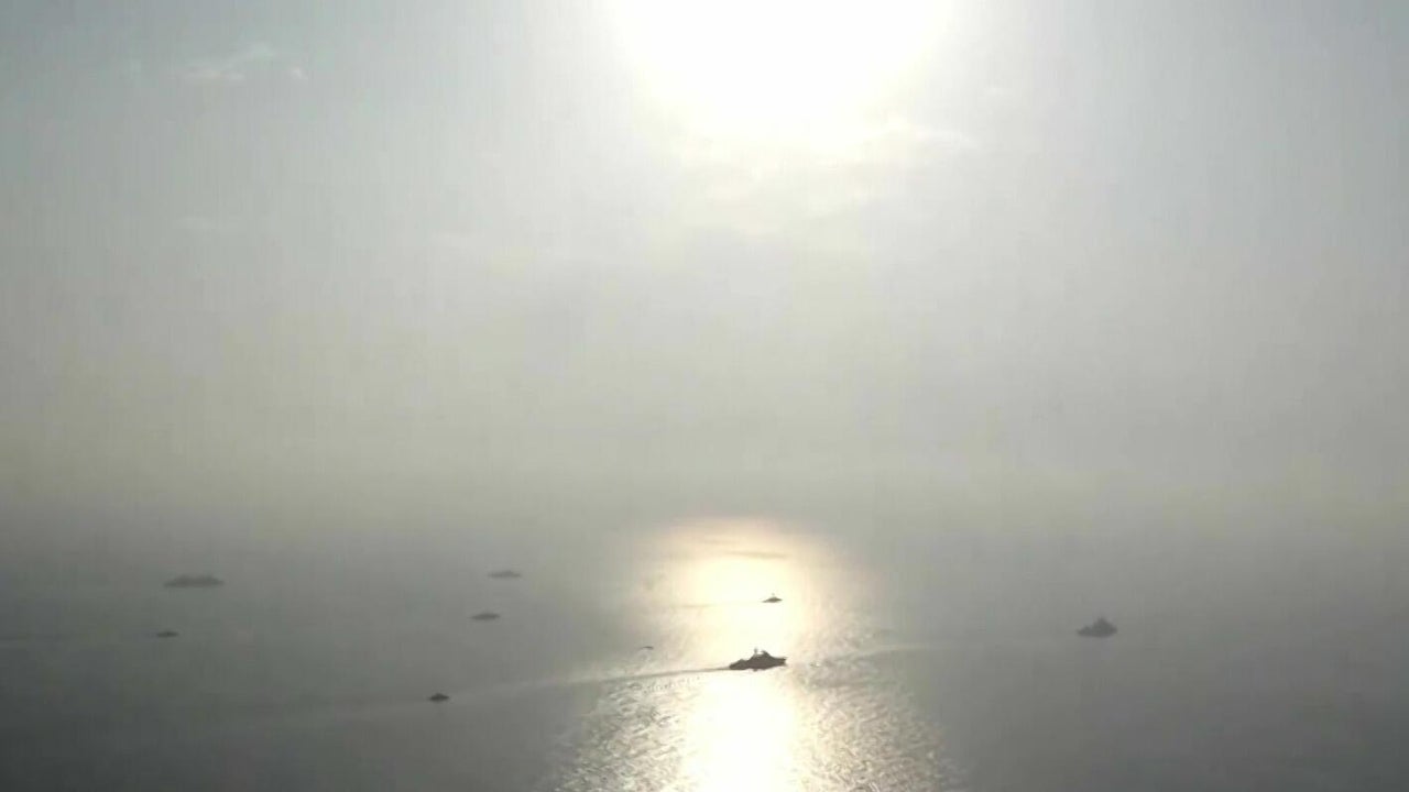 Iran opens fire on ships in Strait of Hormuz hours after Trump ...
