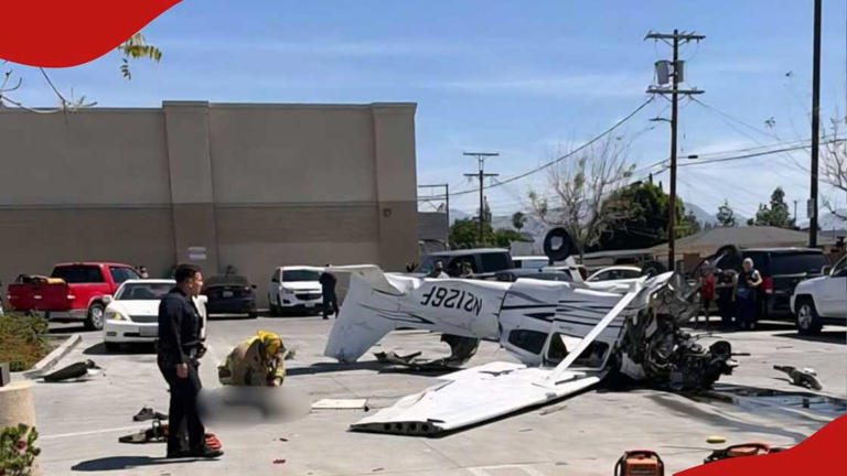 Video: Scary moment as plane hits power line, crashes in parking lot