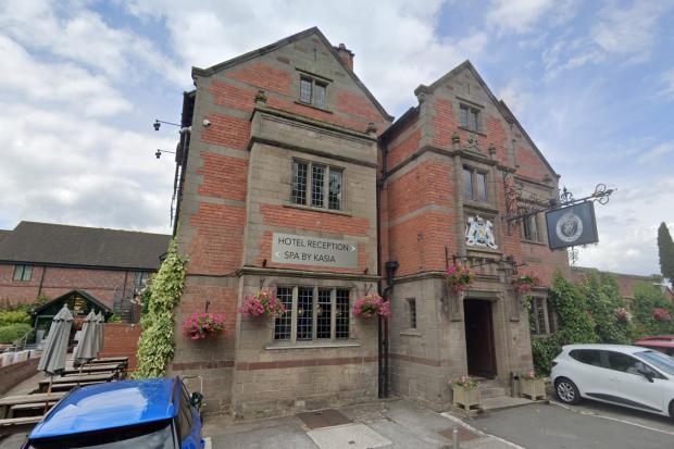 Man arrested after report of disturbance at hotel on Wrexham/Chester border