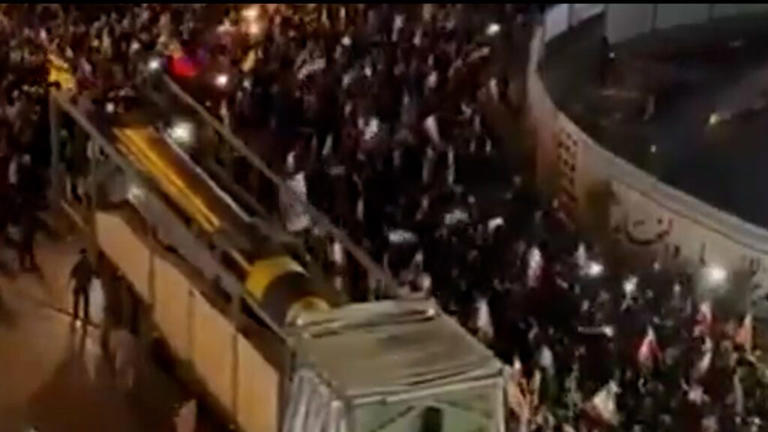 Iran displays what it says are ballistic missiles at pro-regime rally