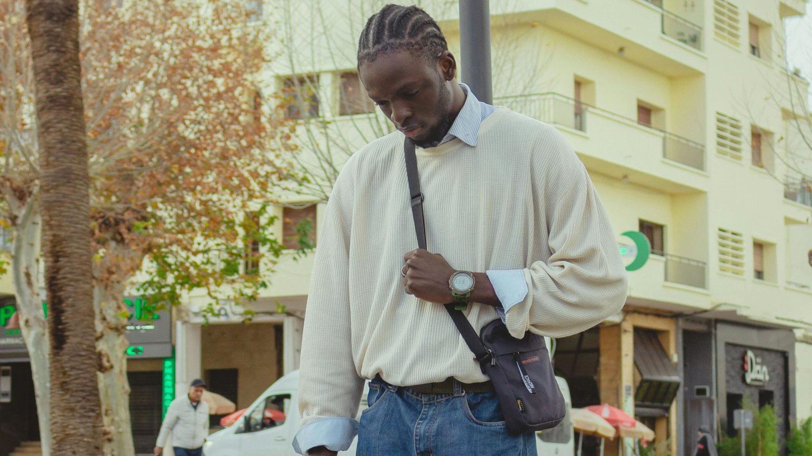 Why every fashionable man in the US is suddenly carrying small bags