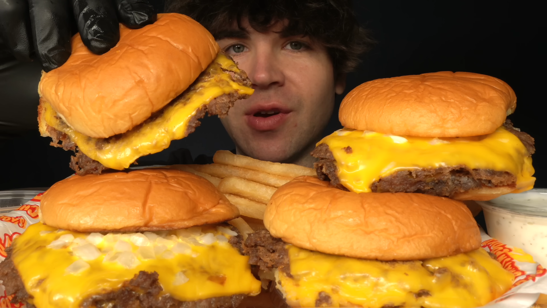 Pro eater eating the viral double smash burgers