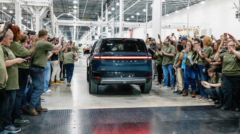 First production Rivian R2 drives off the line just days after a ...