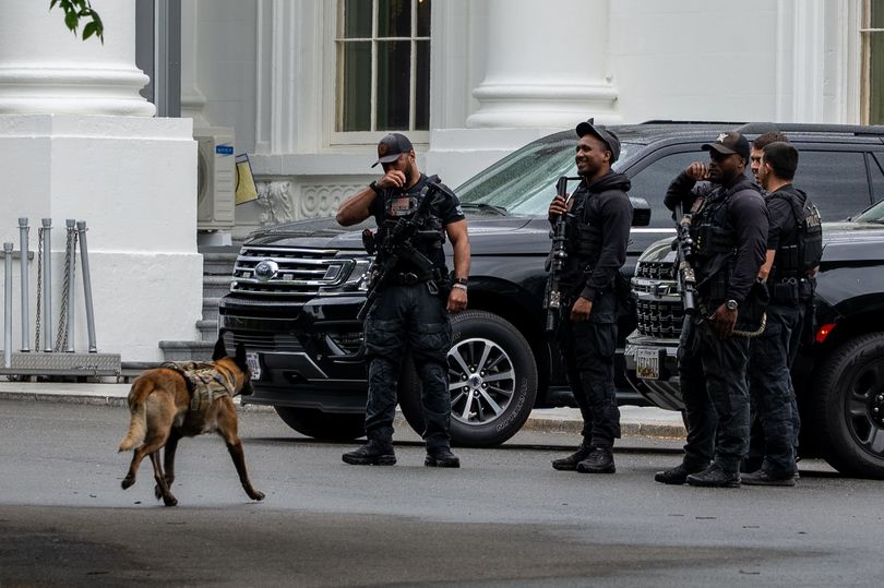 Secret Service ushers reporters into White House briefing room after a ...