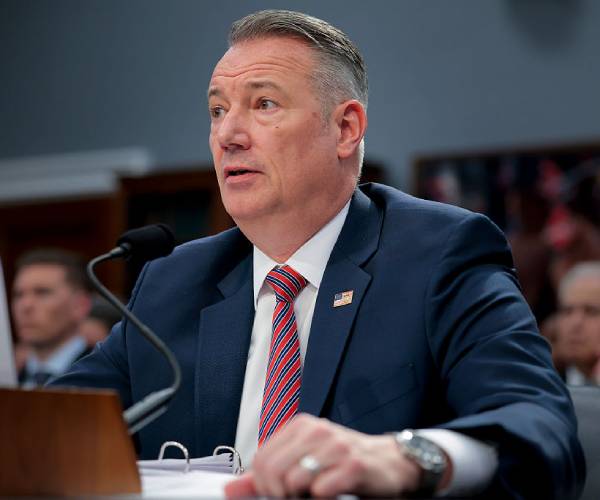 ICE arrests man over threat to acting director