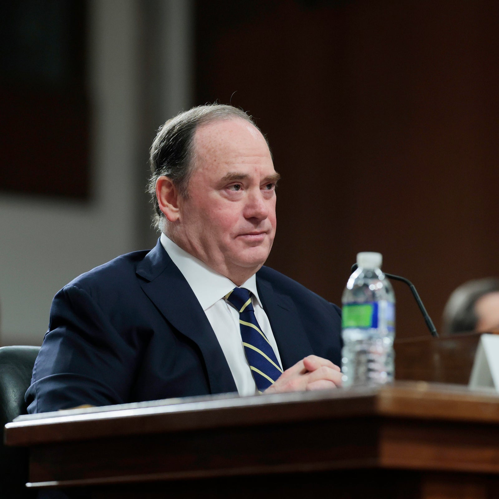 File: President Donald Trump's nominee for Secretary of the U.S. Navy John Phelan listens during a Senate Armed Services confirmation hearing on Capitol Hill on February 27, 2025 in Washington, DC.