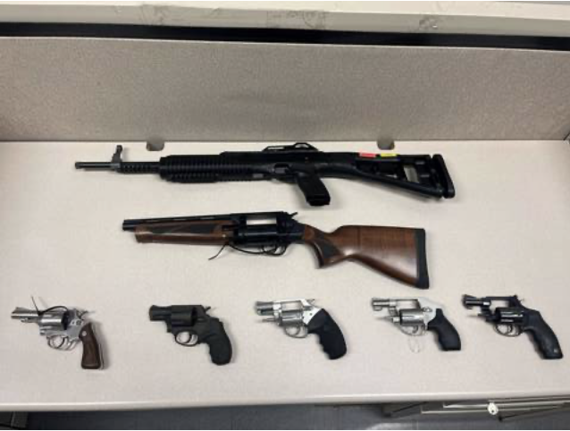 Man charged with weapons trafficking after firearms seized