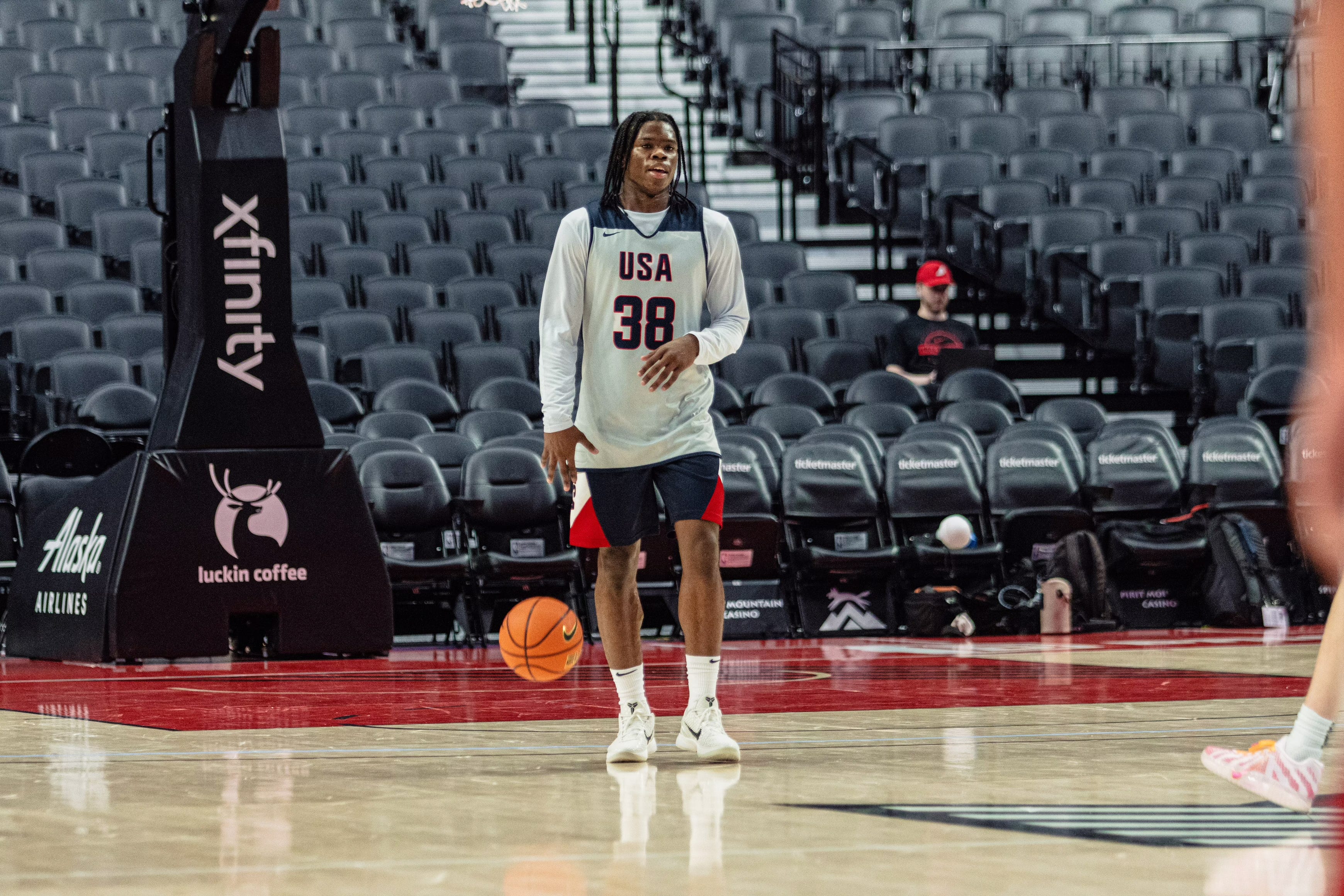 Jordan Smith Jr of Team USA dribbles the ball down the court during a scrimmage on April 9, 2026 at Moda Center in Portland at the 2025 Nike Hoop Summit