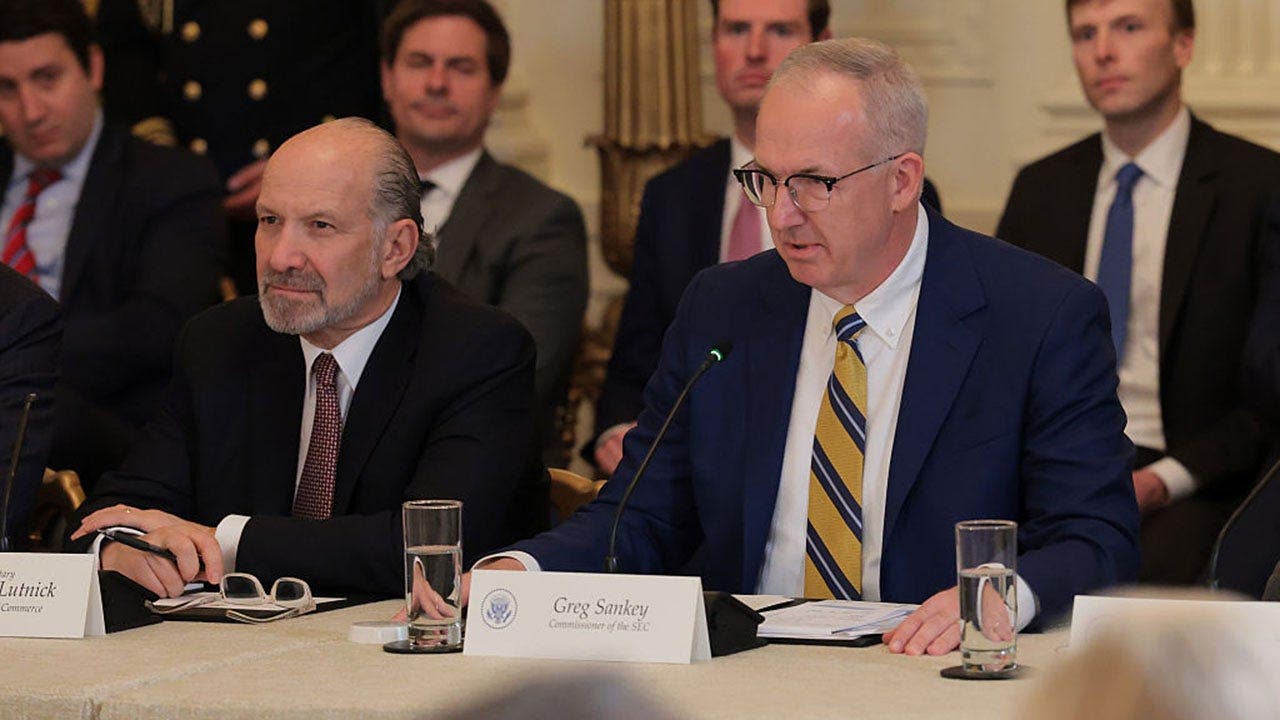 SEC Commissioner Greg Sankey speaks during a roundtable discussion on college sports in the East Room of the White House on March 6, 2026, as Commerce Secretary Howard Lutnick looks on. The Trump administration hosted the event titled 