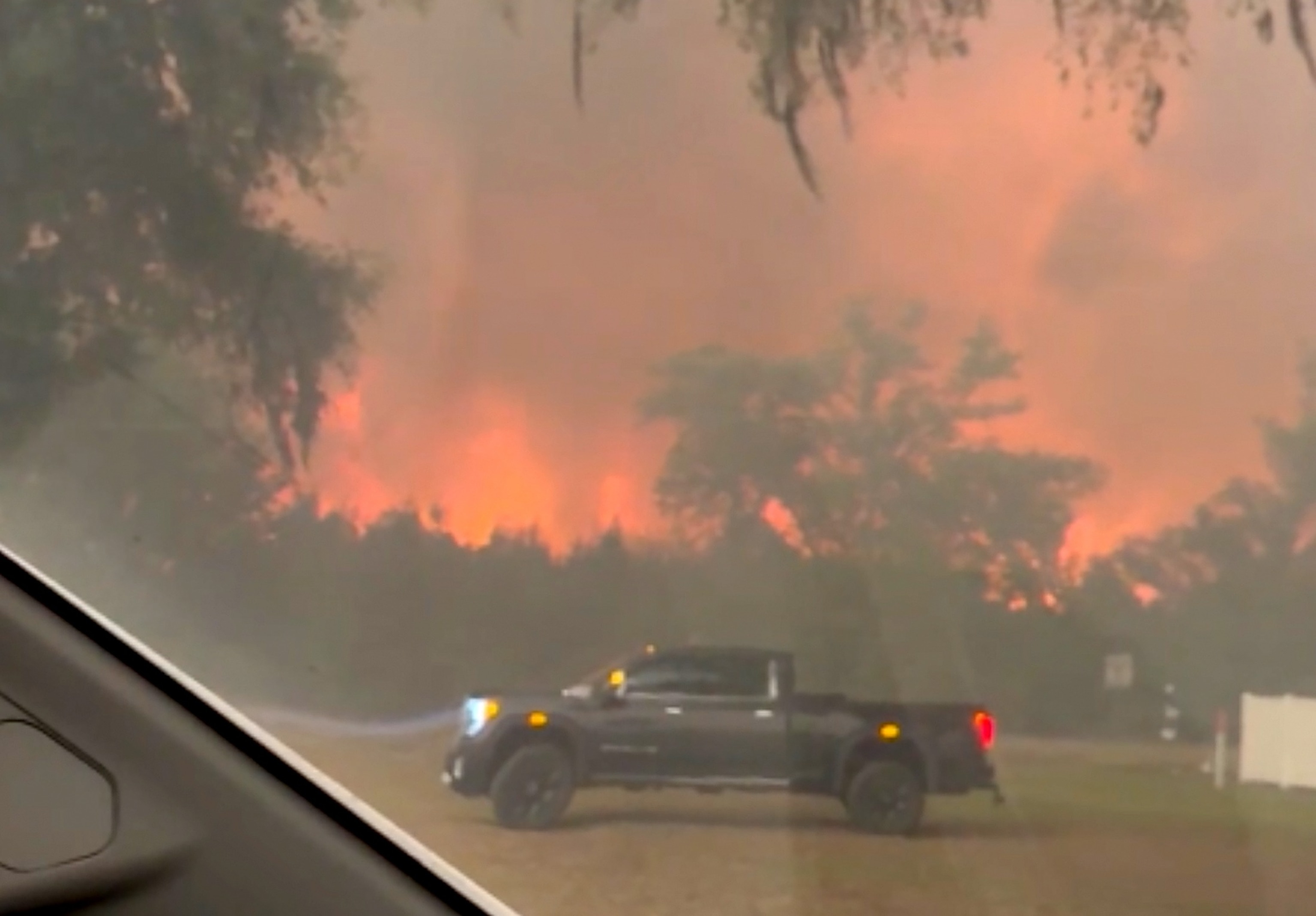 Georgia wildfire destroys dozens of homes, spreads to more than 5,000 acres